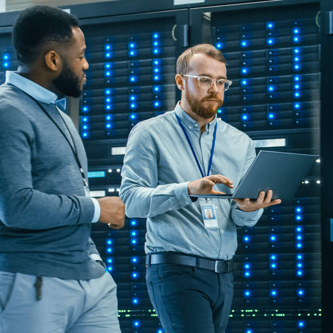 Commercial sector IT Technician with a Laptop Computer